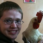 Michael with a chicken in Cabañas, La Paz, Honduras